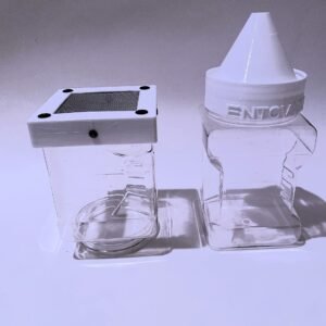 This shows the componets of the large emergent chamber. Water is added to the lower chamber. When mosquitoes emerge, the fly up the funnel into the top chamber where a sugar water soaked cotton ball is placed on the scteen.